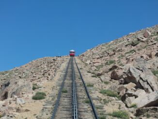 A cog railroad takes tourists to the summit of Pikes Peak.