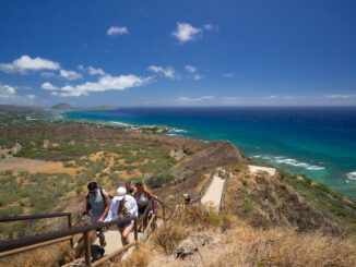 Tourists work their way to the summit of Diamond Head on Oahu.