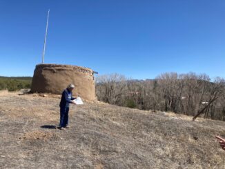Clifford Tsosie stands in front of the Round House. It is one of Picuris’ ritual rooms, used by members of the summer and winter society for rituals and meetings.